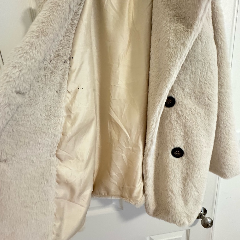 Cream faux fur coat